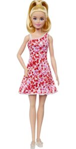 barbie fashionistas doll #205 with blond ponytail, wearing pink and red floral dress, platform sandals and hoop earrings
