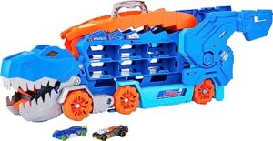 hot wheels city ultimate hauler, transforms into stomping t-rex with race track, lights and sounds, toy storage for 20+ 1:64 scale cars