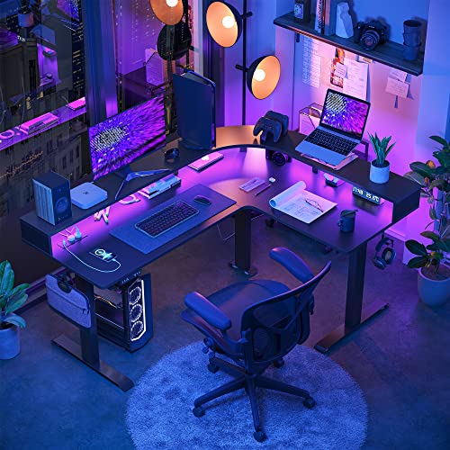 FEZIBO Triple Motor L Shaped Stadning Desk with LED Strip & Power Outrlets，63 inches Height Adjustable Stand up Corner Desk with Ergonomic Monitor Stand, Black Frame/Black Top