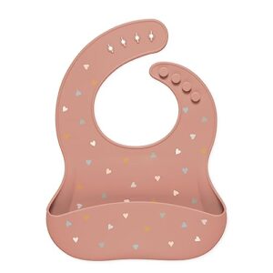 simple modern silicone bib for babies, toddlers | lightweight and durable baby bibs for eating with food catcher pocket | soft silicone with adjustable fit | bennett collection | hearts on pink