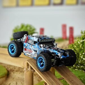 WLtoys 2.4G 4WD 1/28 30KM/H Brushed RC Monster Truck Off-Road Full Proportional Remote Control Car with LED Lights, RC Transmitter And Car Battery - RTR RC Toy Vehicle (RC Cars, RC Truck) (HELIDIRECT)