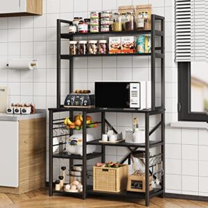 gizoon home kitchen baker's rack with spacious storage, 5 tier versatile microwave stand shelf with basket & side hooks,free standing, sturdy, durable-black