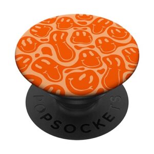 aesthetic orange trippy liquid dripping smile face popsockets standard popgrip