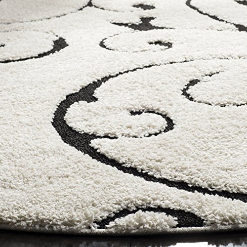 SAFAVIEH Florida Shag Collection Area Rug - 5' Round, Ivory & Black, Scroll Design, Non-Shedding & Easy Care, 1.2-inch Thick Ideal for High Traffic Areas in Living Room, Bedroom (SG455-1290)