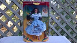 hollywood legends collection, collector edition, 1995 barbie dorothy in "the wizard of oz" in box, never been opened, doll stand and hairbrush included, toto in basket, beautiful art work; mattel 12701