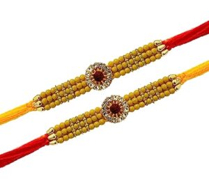 set of two rakhi, stone & moti, thread. rakhi, single rudraksha with golden rings and beads rakhi thread