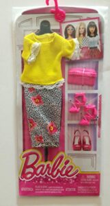 barbie complete fashion spring is here outfit,yellow blouse with white lace-like trim and black and white skirt with pink spring flowers,pink strapped stilletto shoes and matching envelope purse