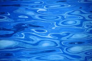 posterazzi water surface ripples in vivid blue. poster print, (34 x 22)
