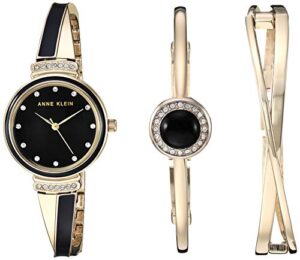 anne klein women's ak/3292bkst premium crystal accented gold-tone and black watch and bangle set