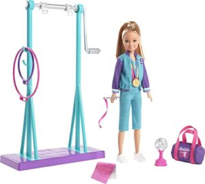 barbie team stacie doll and gymnastics playset with spinning bar and 7 themed accessories for 3 to 7 year olds