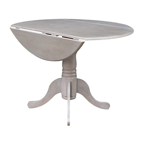 International Concepts 42" Round Dual Drop Leaf Pedestal Table, Washed Gray Taupe