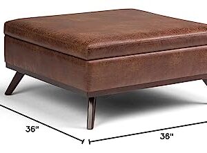 SIMPLIHOME Owen 36 Inch Wide Mid Century Modern Square Coffee Table Lift Top Storage Ottoman in Upholstered Distressed Saddle Brown Faux Leather, For the Living Room