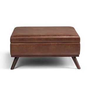 SIMPLIHOME Owen 36 Inch Wide Mid Century Modern Square Coffee Table Lift Top Storage Ottoman in Upholstered Distressed Saddle Brown Faux Leather, For the Living Room
