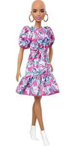 barbie fashionistas doll #150 with no-hair look wearing pink floral dress, white booties & earrings, toy for kids 3 to 8 years old