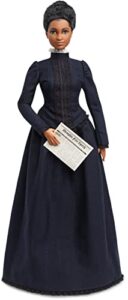 barbie inspiring women doll, ida b. wells collectible with blue dress and newspaper accessory
