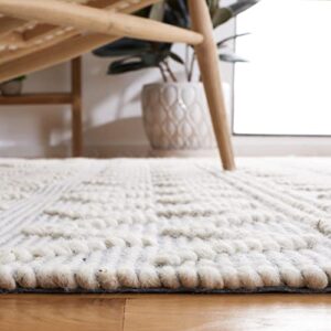 SAFAVIEH Natura Collection Accent Rug - 4' x 6', Ivory & Light Blue, Handmade Moroccan Boho Rustic Braided Tassel Wool, Ideal for High Traffic Areas in Entryway, Living Room, Bedroom (NAT342A)