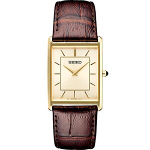seiko swr064 watch for men - essentials collection - water resistant with gold-finish stainless steel case, patterned light champagne dial with gold accents, and textured brown leather strap
