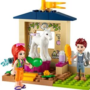 LEGO Friends Pony-Washing Stable 41696 Horse Toy with Mia Mini- Doll, Farm Animal Care Set, Gift Idea for Kids, Girls and Boys 4 Plus Years Old