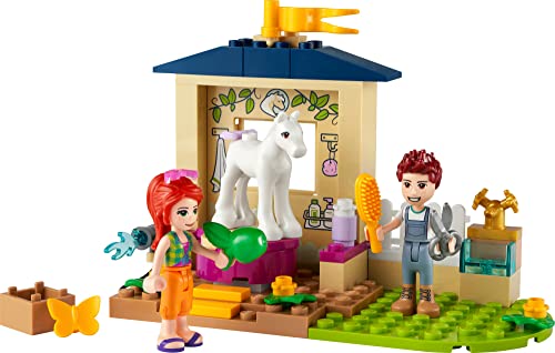 LEGO Friends Pony-Washing Stable 41696 Horse Toy with Mia Mini- Doll, Farm Animal Care Set, Gift Idea for Kids, Girls and Boys 4 Plus Years Old