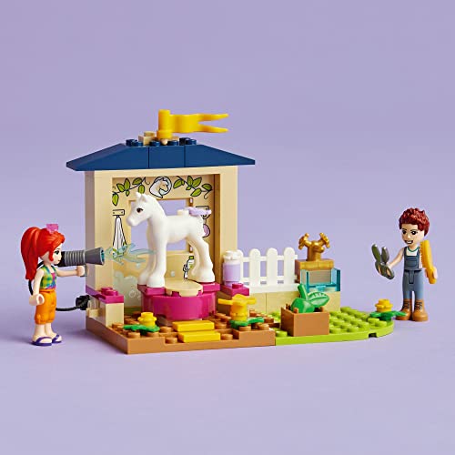 LEGO Friends Pony-Washing Stable 41696 Horse Toy with Mia Mini- Doll, Farm Animal Care Set, Gift Idea for Kids, Girls and Boys 4 Plus Years Old