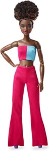 barbie looks doll with natural black hair in color block crop top & raspberry flare pants, posable made to move body for 6 years and older