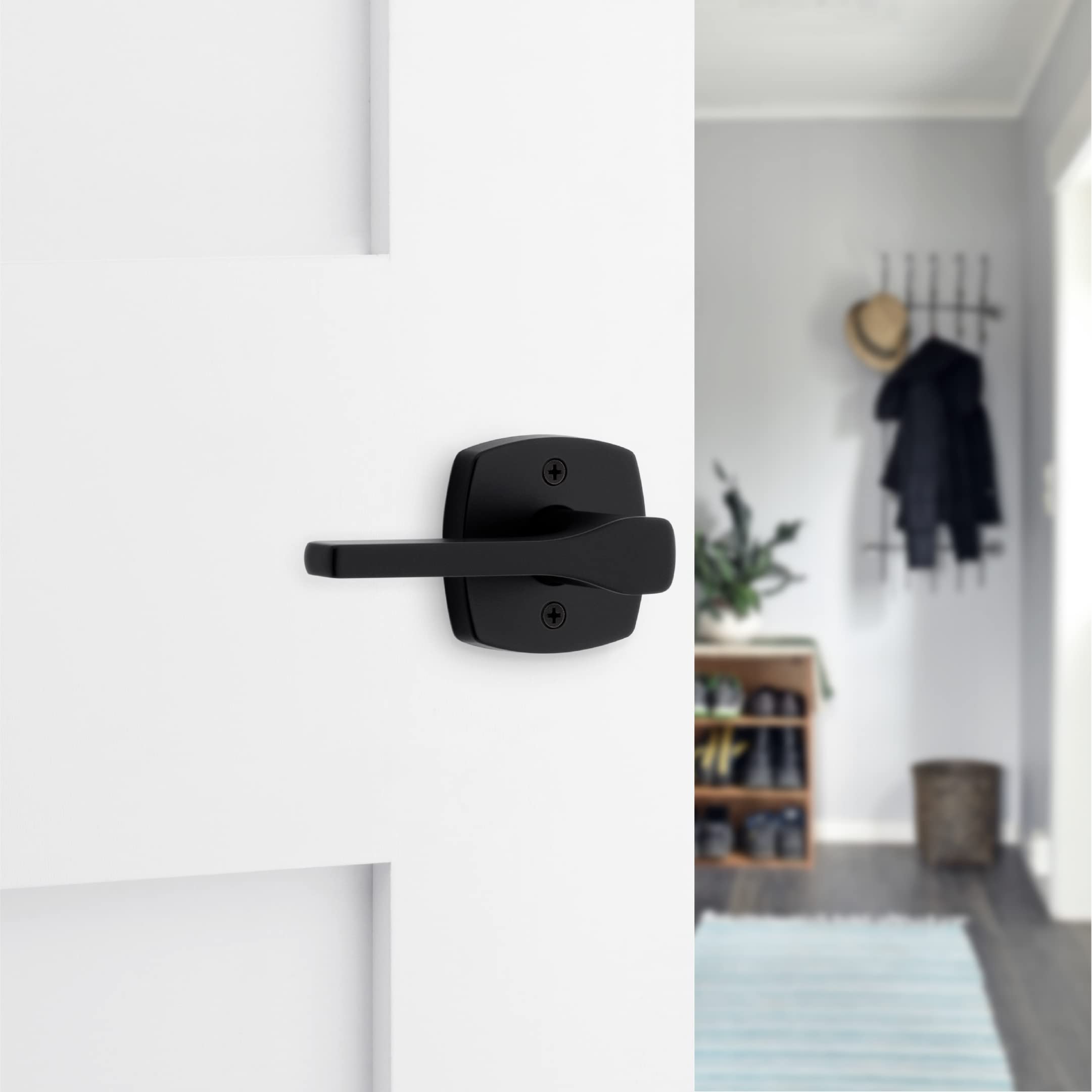 Kwikset Tripoli Passage Hall/Closet Lever with Soft Modern Rose in Matte Black 97200-919