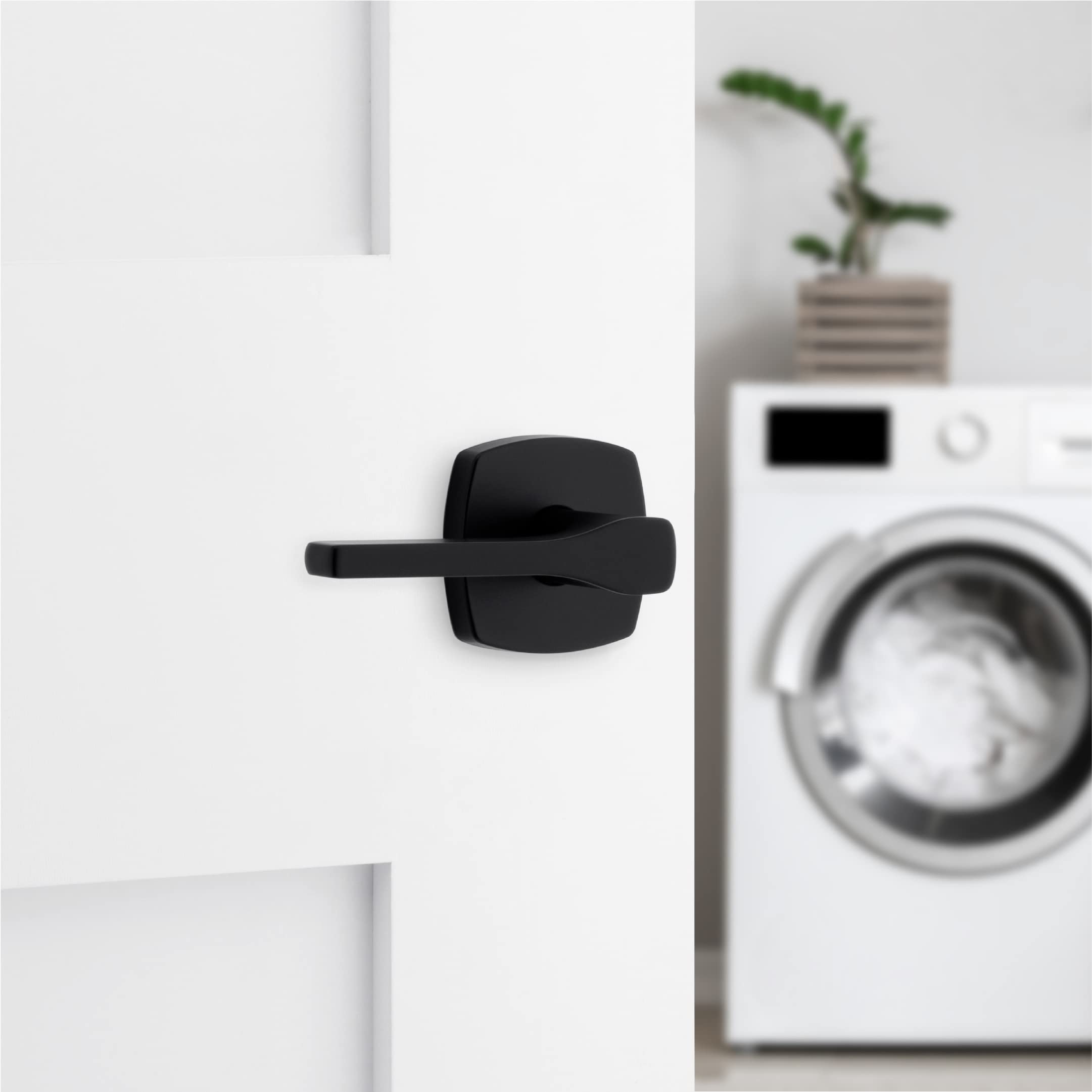 Kwikset Tripoli Passage Hall/Closet Lever with Soft Modern Rose in Matte Black 97200-919