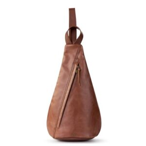the sak geo sling backpack in leather, convertible design, teak