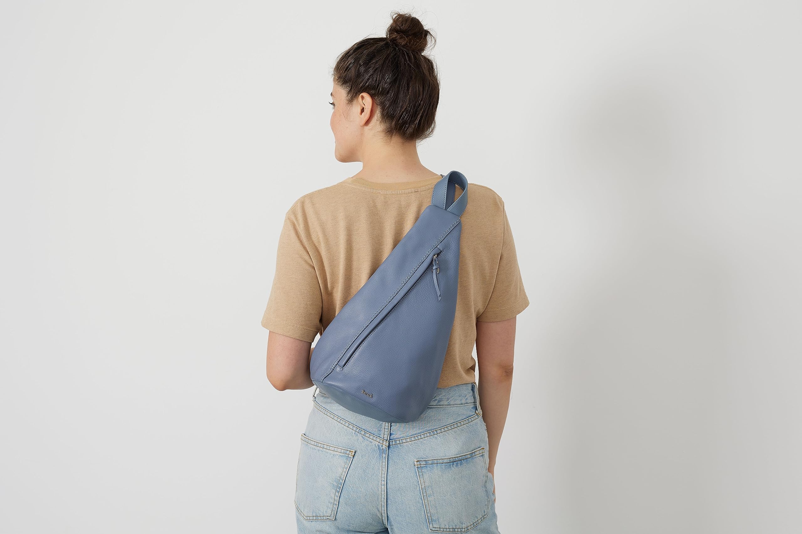The Sak Geo Sling Backpack in Leather, Convertible Design, Tobacco