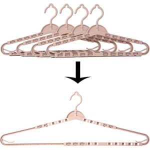 foshine 4 pack extra large hangers big clothes hangers enlarge adjustable shoulder 16.5"-26" drying hanger sturdy for wide polos tops cardigans quilt bath towel big and tall shirts (light pink)