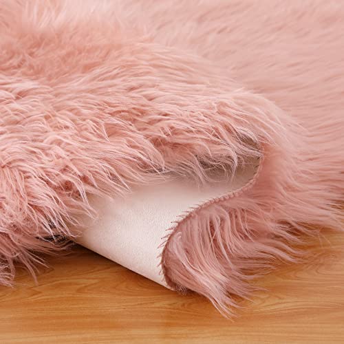 COZYLOOM Faux Fur Rug, Luxury Soft Faux Sheepskin Rug, 2x3 FT Pink Furry Rug Chair Couch Cover Seat Pad for Bedroom Bedside Living Room, Kids Room or Nursery, Floor Sofa Decor