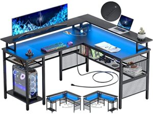 unikito l shaped desk with led strip and power outlets, reversible corner computer desks with monitor stand and storage shelf, modern gaming table, home office desk with usb ports, black