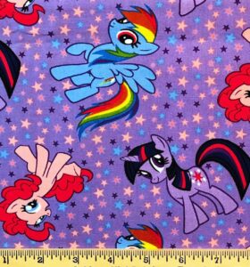 3/4 yard - little pony & stars tossed on lavender purple cotton fabric (great for quilting, sewing, craft projects, throw pillows & more) 3/4 yard (27 inches) x 44 inches