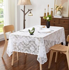 asatex 60 x 84 inch white rectangle lace tablecloth. classic stylish floral pattern is ideal choice for any luxury dining room, birthday, wedding or holiday celebration. mit white 84"