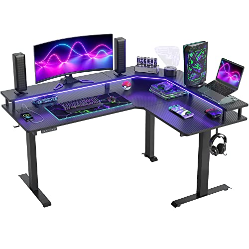 FEZIBO 63" Triple Motor L Shaped Standing Desk with LED Strip & Power Outlets, Height Adjustable Stand up Corner Gaming Desk with Ergonomic Monitor Stand, Black Carbon Fiber Top/Black Frame