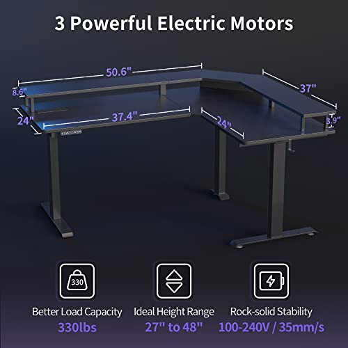 FEZIBO 63" Triple Motor L Shaped Standing Desk with LED Strip & Power Outlets, Height Adjustable Stand up Corner Gaming Desk with Ergonomic Monitor Stand, Black Carbon Fiber Top/Black Frame