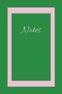 green notebook with light pink trim