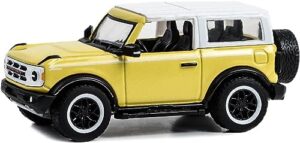 2023 bronco heritage edition yellowstone metallic with oxford white top showroom floor series 3 1/64 diecast model car by greenlight 68030d