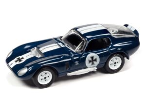 shelby cobra daytona klutzmobile blue metallic with white stripes the monkees with collectible tin display silver screen machines series 1/64 diecast model car by johnny lightning jldr018-jlsp334