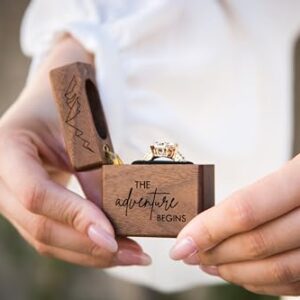 MUUJEE The Adventure Begins Slim Engagement Ring Box - Engraved Wooden Ring Box for Wedding Ceremony Engagement Proposal Ring Bearer Box - Anniversary Birthday Gift Ideas