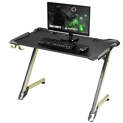 EUREKA ERGONOMIC & Call of Duty UAV Gaming Desk, RGB LED 45 Inch Z Shaped Home Office PC Computer Gamer Table with Fiber Light Dual Headphone Holder Cable Ties for Gamer Gifts, Black & Brass