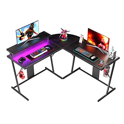 Bestier 55 Inch Gaming Desk with Led Lights L Shaped Corner Gamer Desk with Long Monitor Shelf Cup Holder Headset Hook Home Office Desk, Carbon Fiber Black