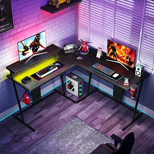 Bestier 55 Inch Gaming Desk with Led Lights L Shaped Corner Gamer Desk with Long Monitor Shelf Cup Holder Headset Hook Home Office Desk, Carbon Fiber Black