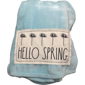 rae dunn velvet soft plush throw on blue | inscribed: hello spring with flowers | 50" x 70”