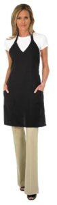 betty dain silhouette stylist apron in black for salon hairstylist and professional cosmetology featuring a v-neck design | water resistant, lightweight polyester with adjustable snap-closure