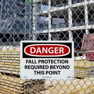 NMC D528RB – DANGER – FALL PROTECTION REQUIRED BEYOND THIS POINT – 14 in. x 10 in. Plastic Danger Sign with White/Black Text on Red/White Base