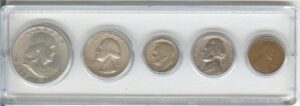1948 birth year coin set (5) coins half dollar, quarter, dime, nickel, and cent mounted in a plastic holder very good