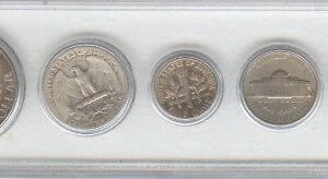 1949 BIRTH YEAR COIN SET, 5 COINS TOTAL-, SILVER HALF DOLLAR, SILVER QUARTER, SILVER DIME, NICKEL, CENT-, ALL DATED 1949 AND DISPLAYED IN A PLASTIC HOLDER--NOTE-- THESE COINS WILL BE AS GOOD OR BETTER THEN THE PICTURE--NOTHING LESS