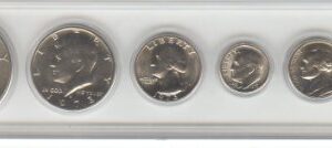 1973 BIRTH YEAR COIN SET- 6 COINS- EISENHOWER DOLLAR, KENNEDY HALF DOLLAR, QUARTER, DIME, NICKEL, AND CENT- ALL DATED 1973 AND DISPLAYED IN A HARD PLASTIC CASE- COINS ARE UNCIRCULATED