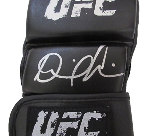 Daniel Cormier Autographed UFC Distress Fight Glove W/PROOF, Picture of Daniel Signing For Us, Ultimate Fighting Championship, Sherdog, UFC Heavyweight, Strikeforce, Oklahoma State Cowboys